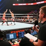 Exciting wrestling event with stillrealtous capturing live matches and energetic crowd.